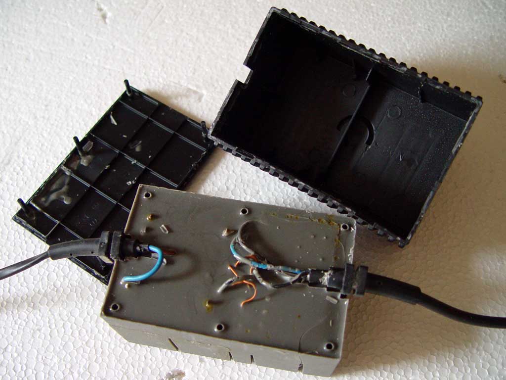 The Vic 20 PSU, still encased in resin,
 persuaded from its box