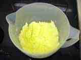 Make a crater in the butter sugar mix,
then pour in the melted chocolate..